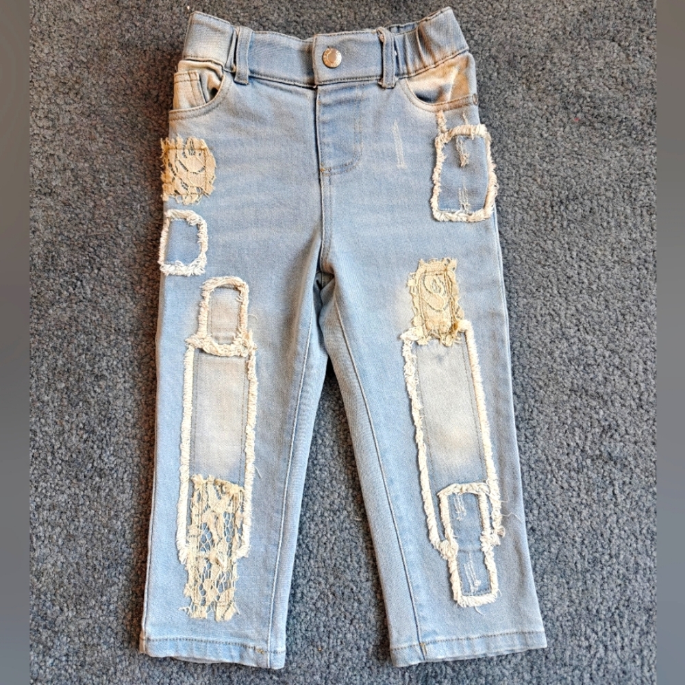 Baby Sara patched jeans for a little girl